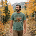 Man wearing a Green Grateful Trails Christian hiking t-shirt outdoors, 1 Thessalonians 5:18