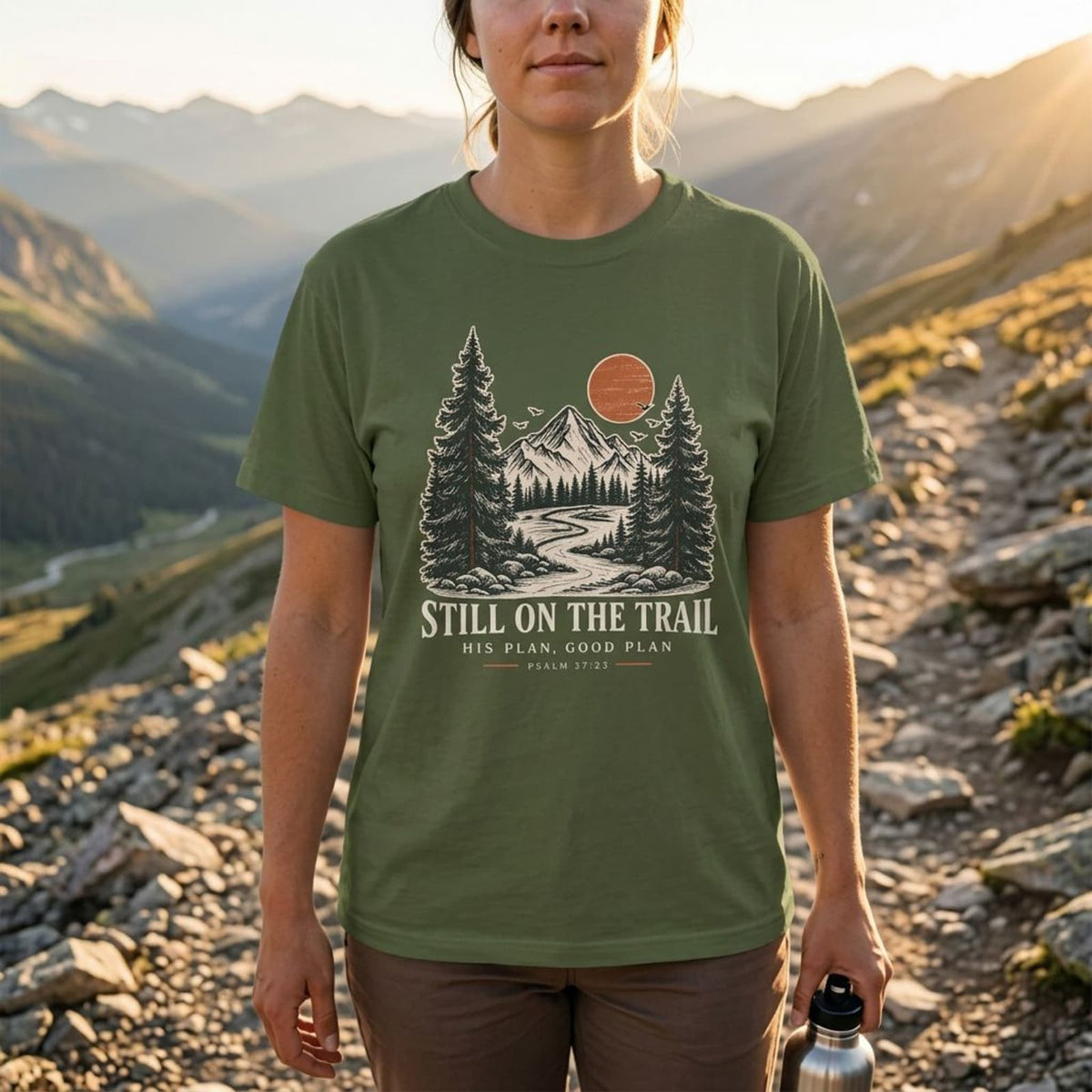 Sage  Still on the Trail T-shirt featuring a vintage mountain graphic inspired by Psalm 37:23