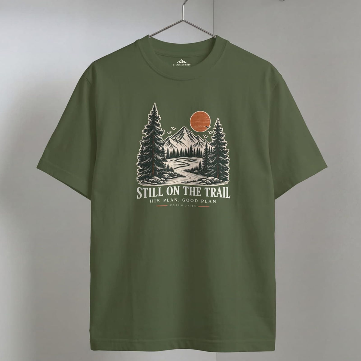 Sage Still on the Trail T-shirt featuring a vintage mountain graphic inspired by Psalm 37:23.
