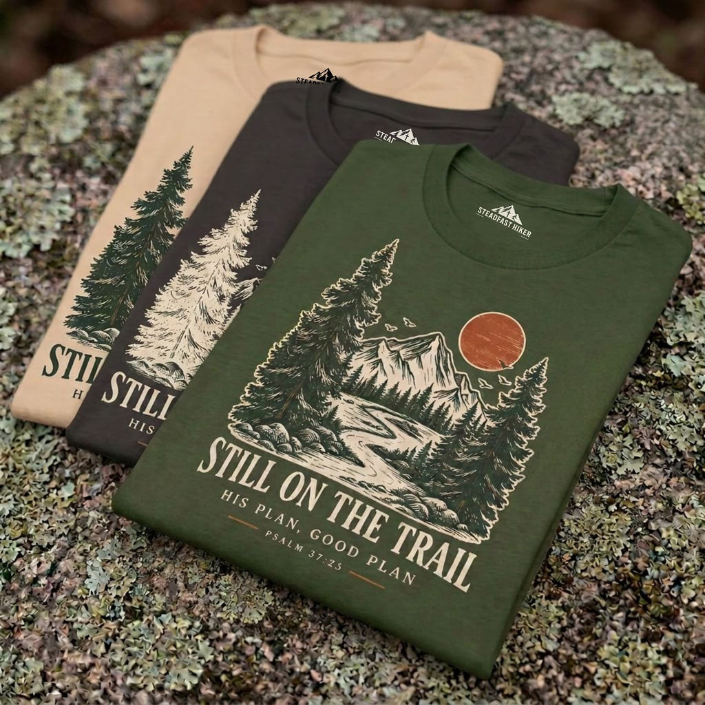 Still on the Trail Christian hiking T-shirt displayed in multiple available colors