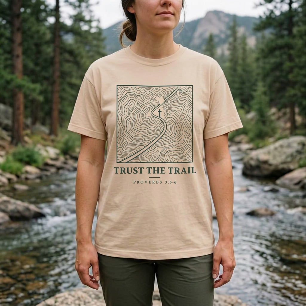 Woman wearing an Ivory Trust the Trail Christian hiking t-shirt outdoors, Proverbs 3:5-6