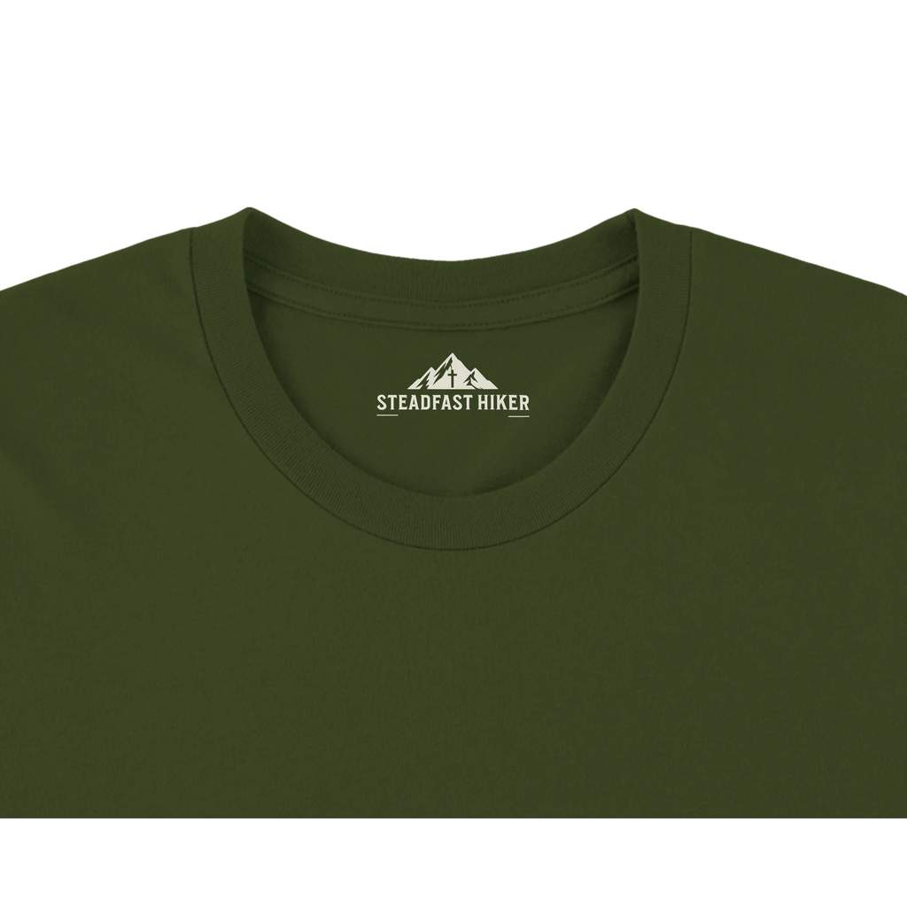 Close-up of Trust the Trail T-shirt neckline and interior label