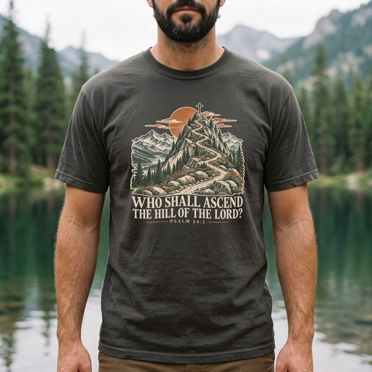Man wearing a Pepper Who Shall Ascend Christian hiking t-shirt by an alpine lake, Psalm 24:3